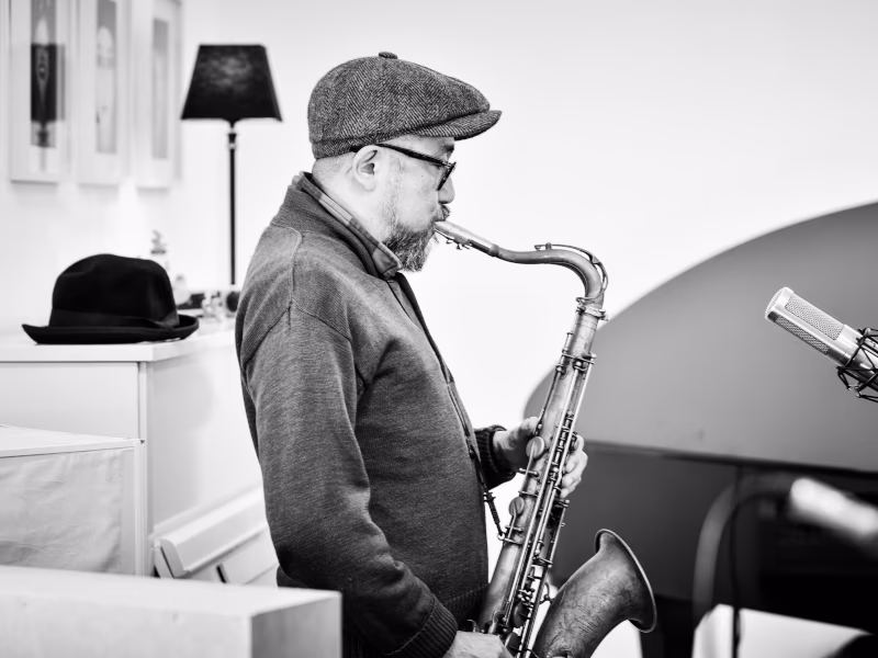 Han Soto playing tenor saxophone in the main room