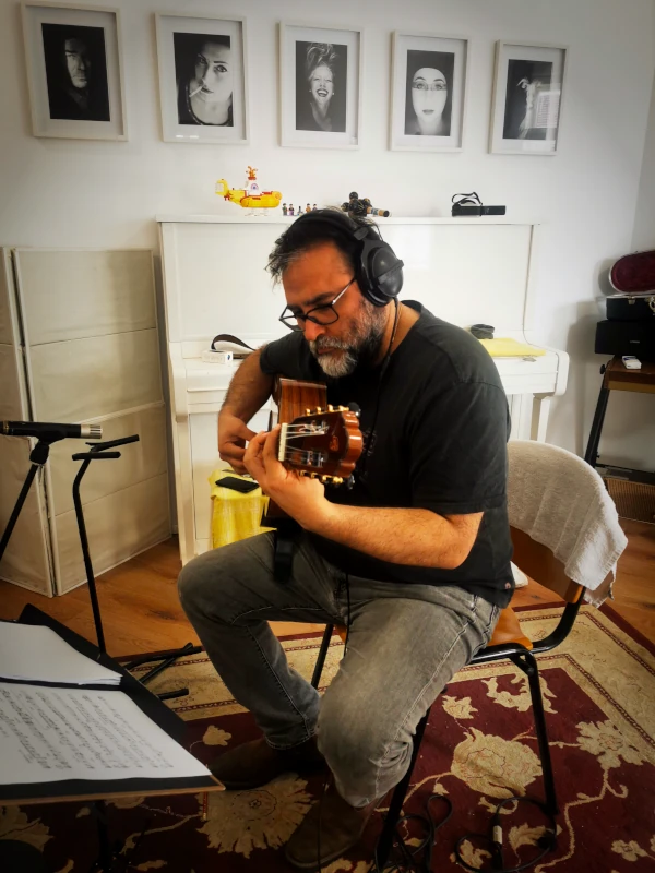 Rodrigo Santa María playing nylon-string guitar in the main room at Hot Milk Studio Berlin.